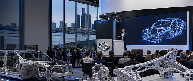 Meridian presenting a vehicle structure at an industry conference